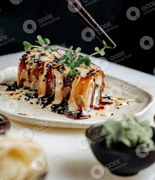 Delicious sushi rolls drizzled with sauce and garnished with herbs and sesame seeds.