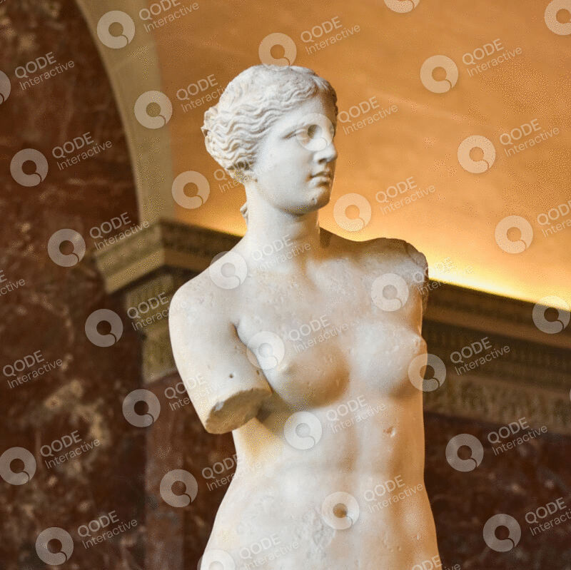 Classical marble statue of a female figure missing arms.