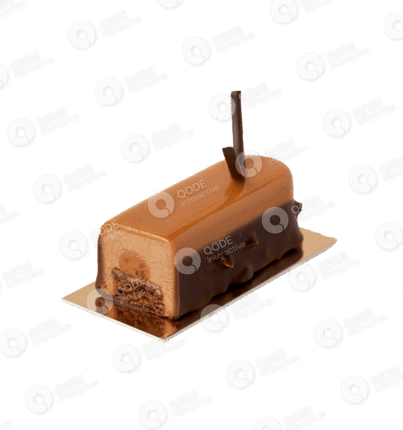 A rectangular chocolate dessert with a thin chocolate stick on top.