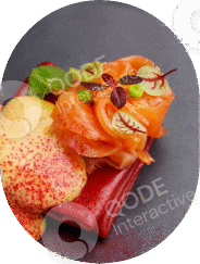 Artistic smoked salmon dish with garnishes and sauces on a plate.